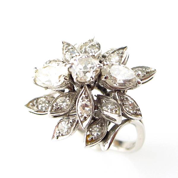 Appraisal: A marquise-cut diamond round diamond and k white gold ring