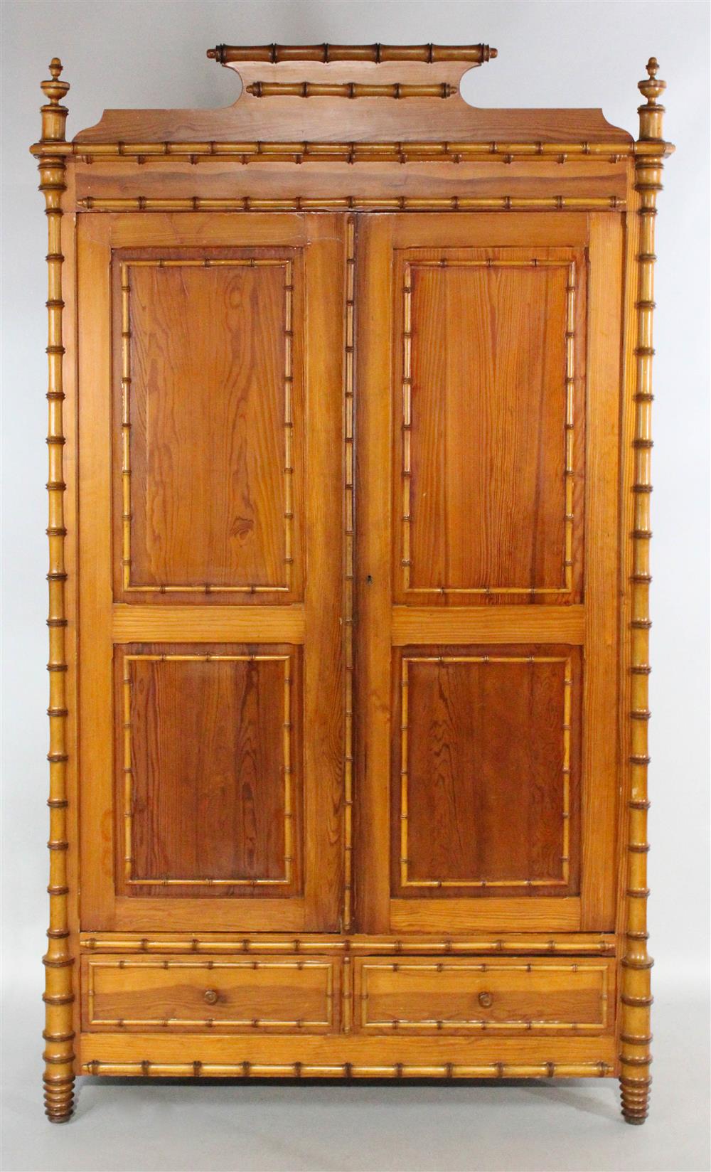 Appraisal: VICTORIAN STYLE PINE FAUX BAMBOO ARMOIRE with a shaped rectangular