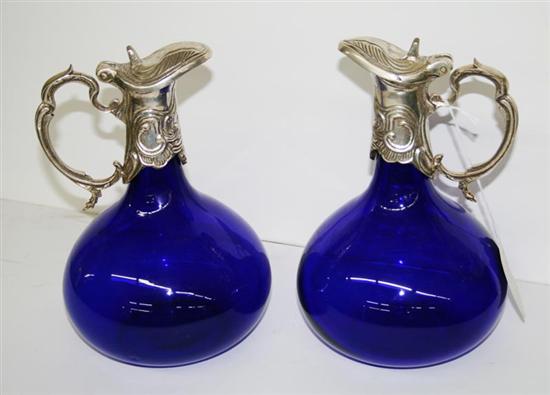 Appraisal: Pair silverplate cobalt glass decanters H