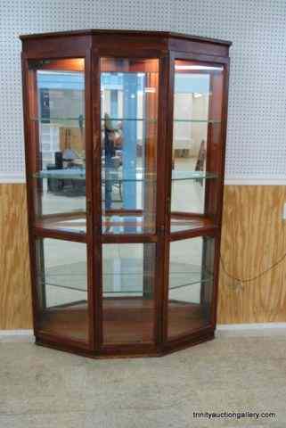 Appraisal: Mahogany Beveled Glass Lighted Curio CabinetFrom an estate is is