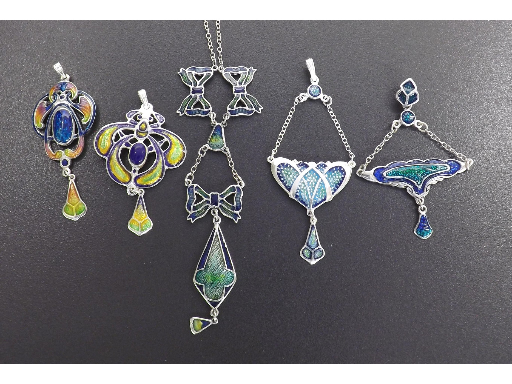 Appraisal: Four various Art Nouveau style silver and enamel pendants also