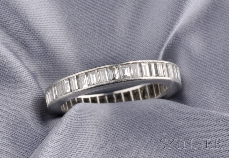 Appraisal: Platinum and Diamond Eternity Band channel-set with forty-five baguette diamonds