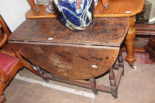 Appraisal: AN TH CENTURY OAK GATELEG TABLE together with a th