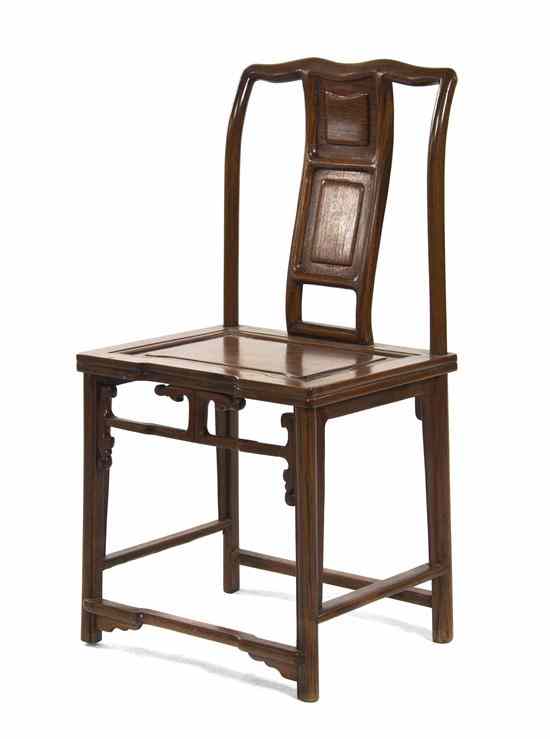 Appraisal: A Chinese Huanghuali Side Chair having shaped top rail above