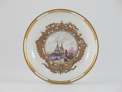 Appraisal: A Meissen saucer the centre painted with a harbour scene