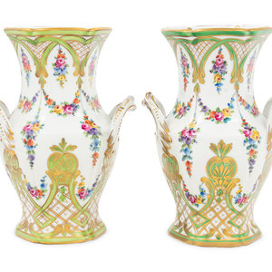 Appraisal: A Pair of Dresden Porcelain Urns th Century each with