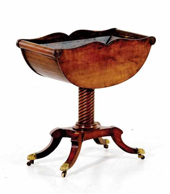 Appraisal: Regency mahogany jardiniere circa half-round form with cyma-curve edge retaining