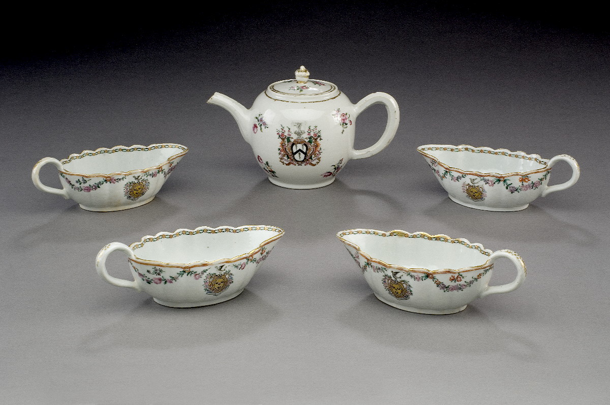 Appraisal: SET OF FOUR CHINESE EXPORT PORCELAIN ARMORIAL SAUCEBOATS CIRCA Each