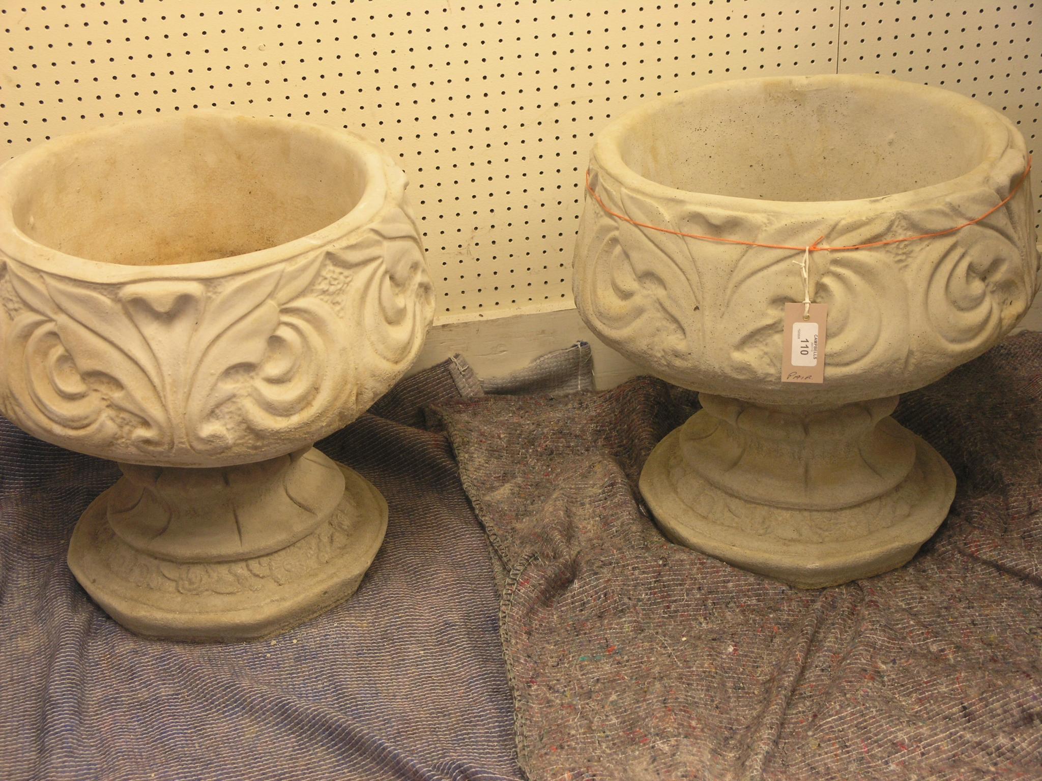 Appraisal: A pair of garden planters circular pedestal form with Fleur