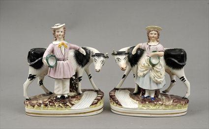 Appraisal: Pair of Staffordshire Pottery Figure Groups to x in