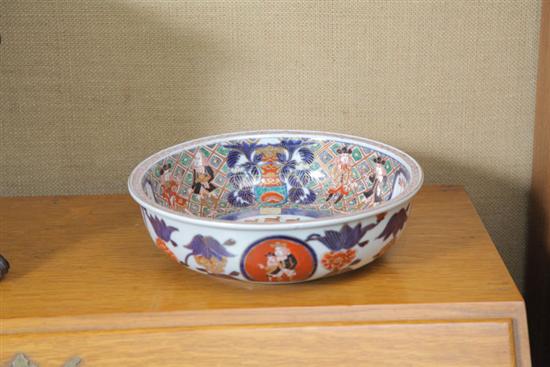 Appraisal: IMARI BLACK SHIP PATTERN BOWL Having gilt decoration with ship