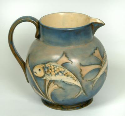 Appraisal: A MOORCROFT POTTERY JUG of bellied form tube lined with