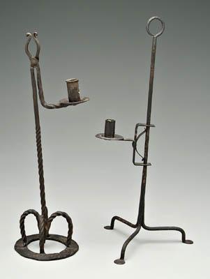 Appraisal: Two wrought iron candleholders one with adjustable spring loaded single