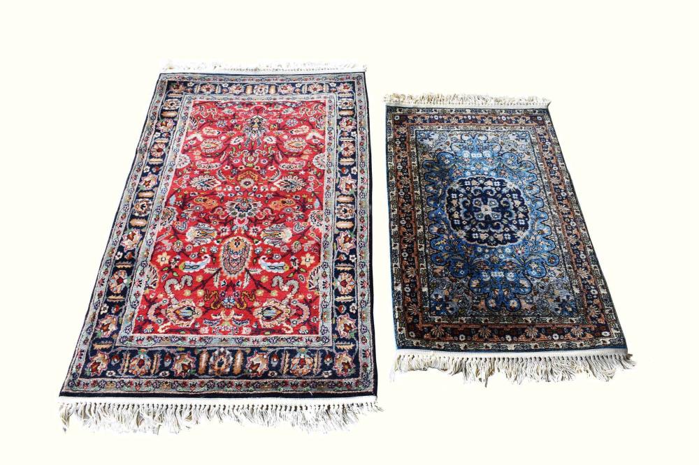 Appraisal: TWO TABRIZ RUGSThe first with flowers on a red field