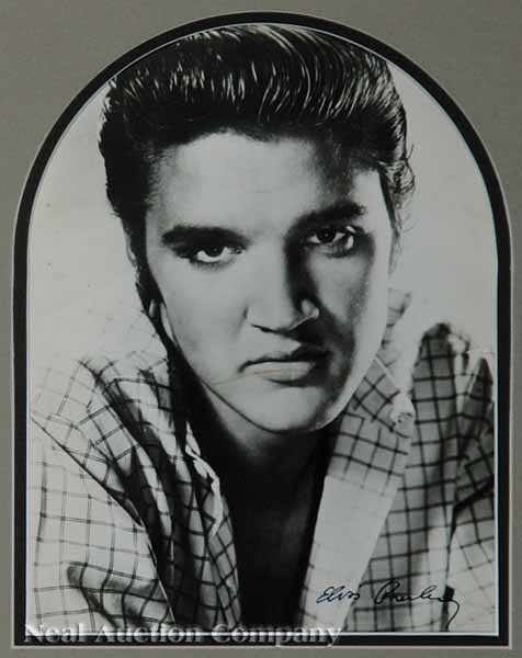 Appraisal: An Autographed Photograph of Elvis Presley signed lower right sight