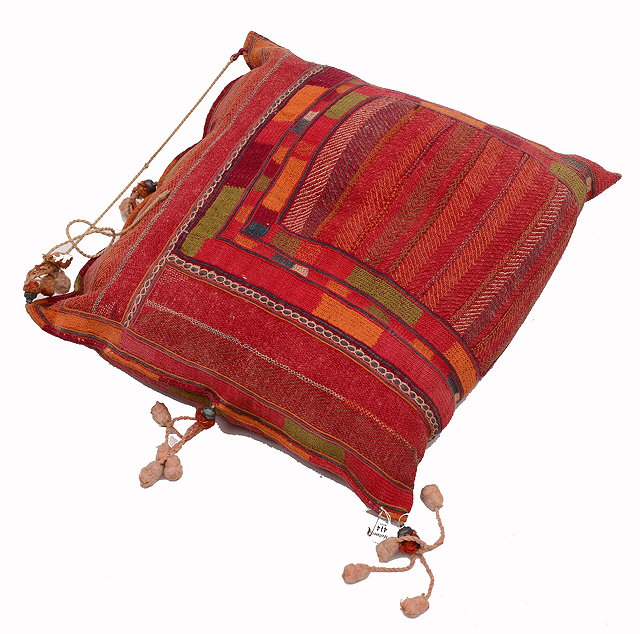 Appraisal: AN INDIAN COTTON CUSHION with polychrome banded decoration approximately cm