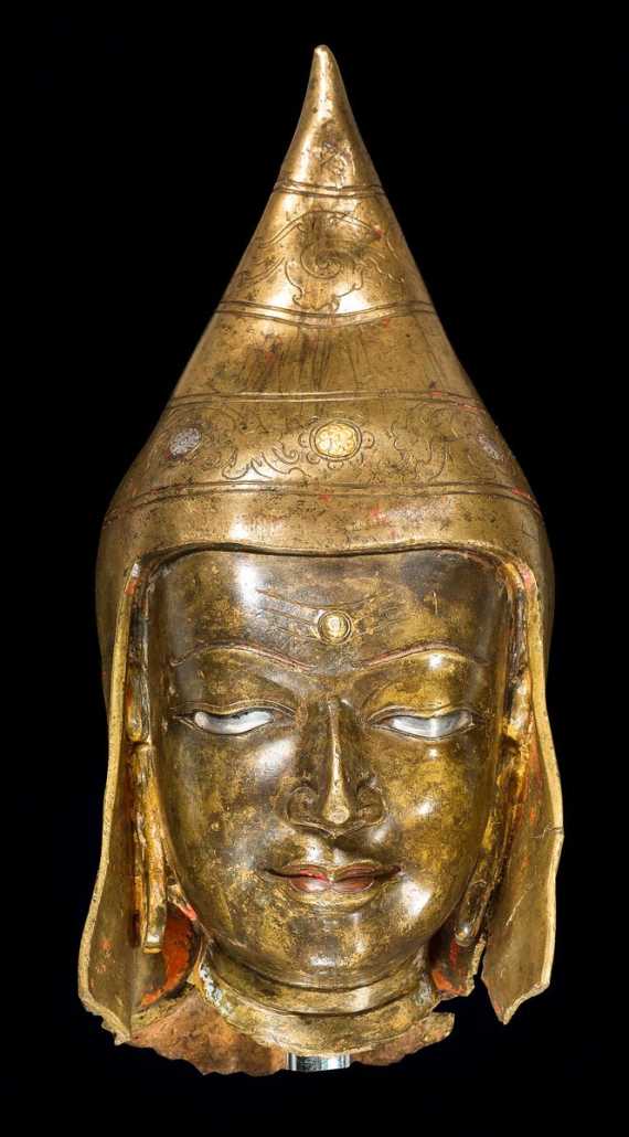 Appraisal: A FINE BRONZE HEAD OF A MONK Tibet ca th