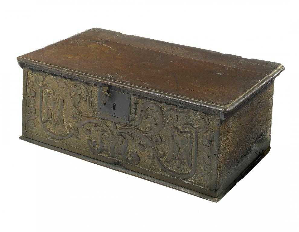 Appraisal: A CHARLES II OAK BOARDED DESK BOX with moulded lid