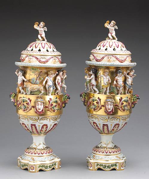 Appraisal: A pair of Capodimonte style porcelain urns first quarter th