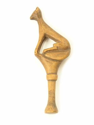 Appraisal: An th century carved treen tamper with a seated fox