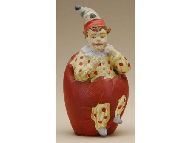 Appraisal: Clown in Egg Candy Container Germany ca painted and molded