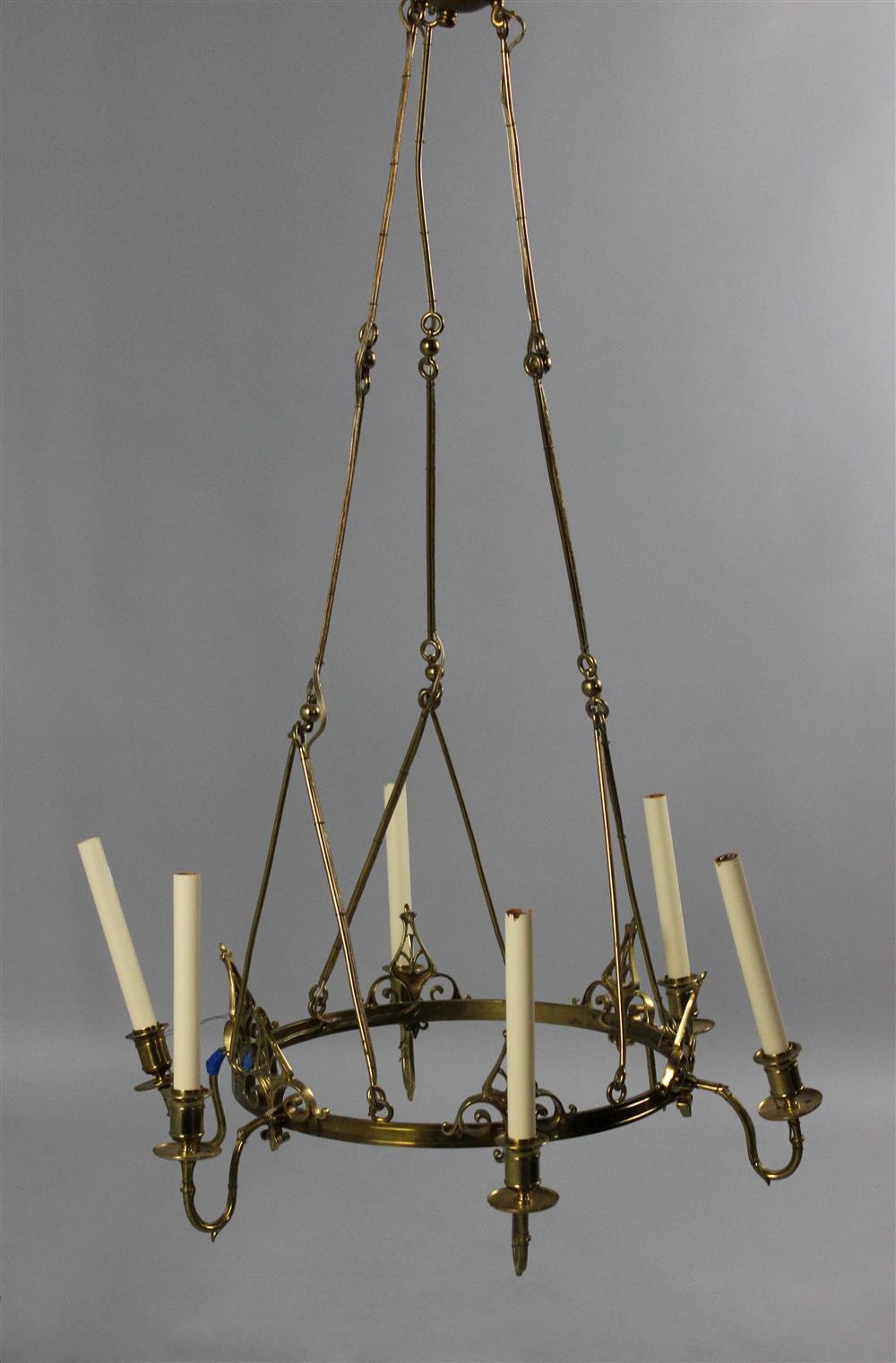 Appraisal: CROWN SHAPED BRASS SIX-LIGHT CHANDELIER the round crown shaped brass