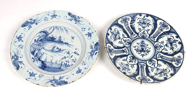 Appraisal: AN TH CENTURY DELFT PLATE the centre painted with river