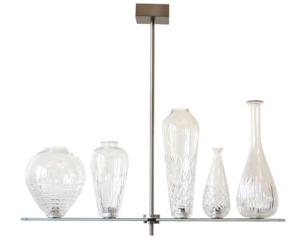 Appraisal: A PHILIPPE STARCK GLASS CRYSTAL FLOATING BOTTLE CHANDELIER Manufactured by