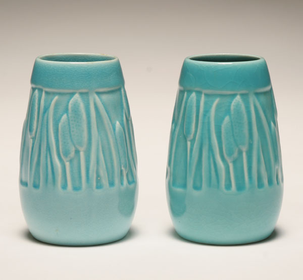 Appraisal: Pair Rookwood Cattail art pottery vases in a turquoise high