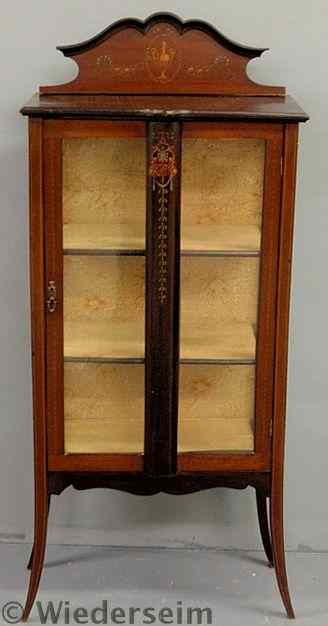 Appraisal: Inlaid mahogany and glass display cabinet c h x w