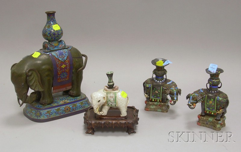 Appraisal: Four Chinese Elephants a pair of enameled elephant candlesticks on