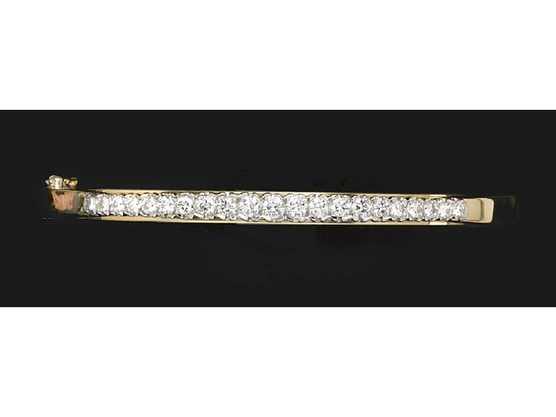 Appraisal: DIAMOND BRACELET k yellow gold bangle with white gold crown