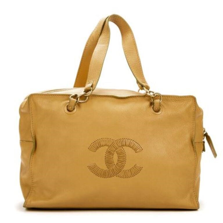 Appraisal: Chanel logo zip shoulder bag in beige grained leather with