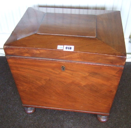 Appraisal: A George III mahogany cellerette of sarcophagus form with fitted