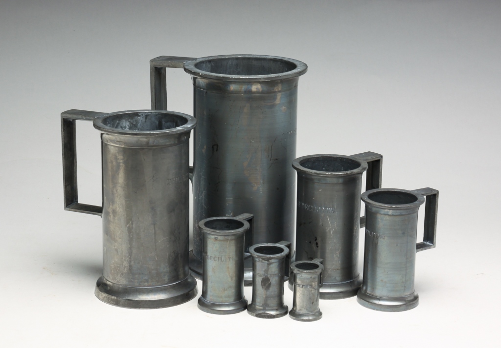 Appraisal: SEVEN GRADUATED FRENCH PEWTER MEASURES Twentieth century Can-shaped with squared