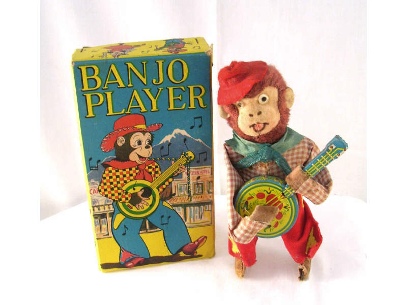 Appraisal: Mechanical Monkey Banjo Player Fabric on tail is missing working