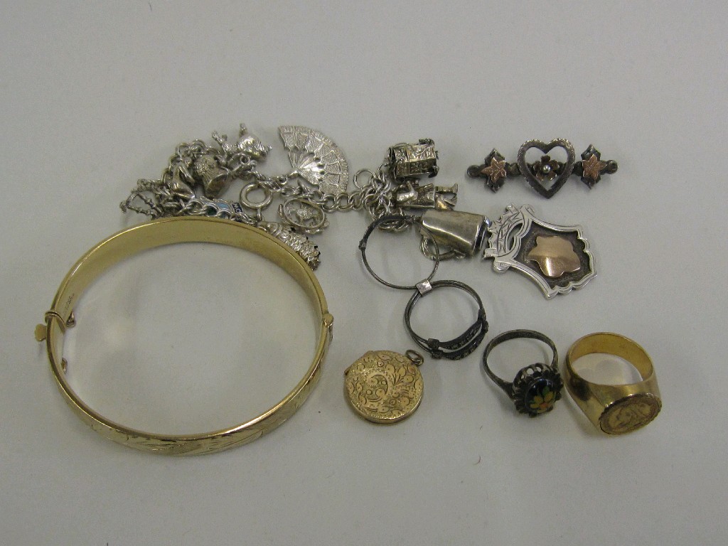 Appraisal: Lot comprising silver charm bracelet rolled gold bangle two silver