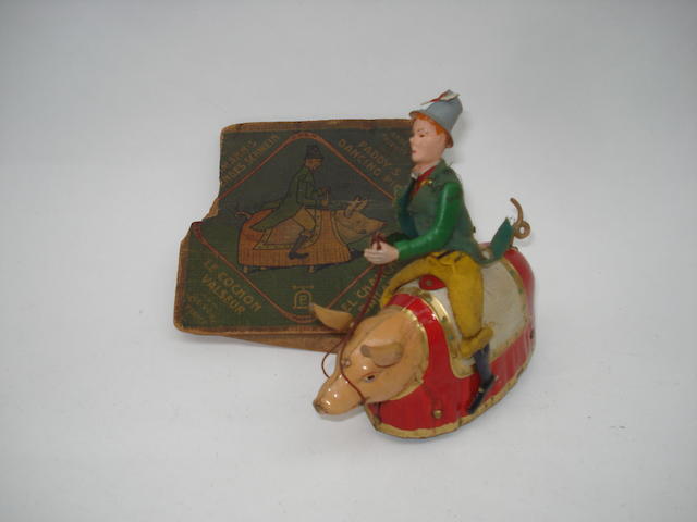 Appraisal: Lehman Paddy's Dancing Pig Painted tinplate pig with c w