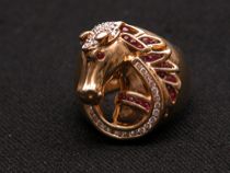 Appraisal: Lucky Gold Horse Ring with Diamonds and Rubies This K