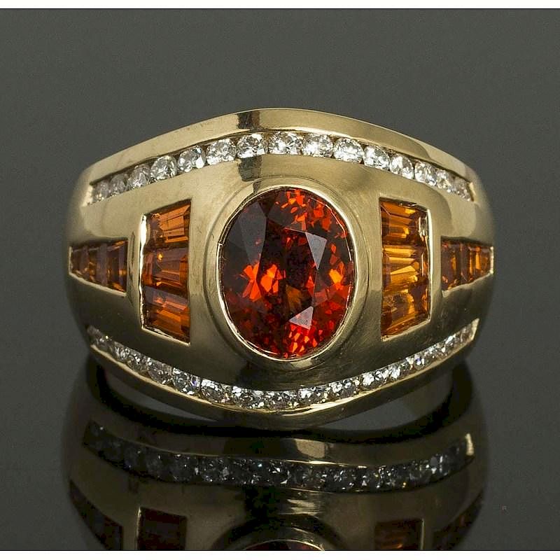 Appraisal: Hessonite Garnet Diamond Gold RIng k yellow gold ring containing