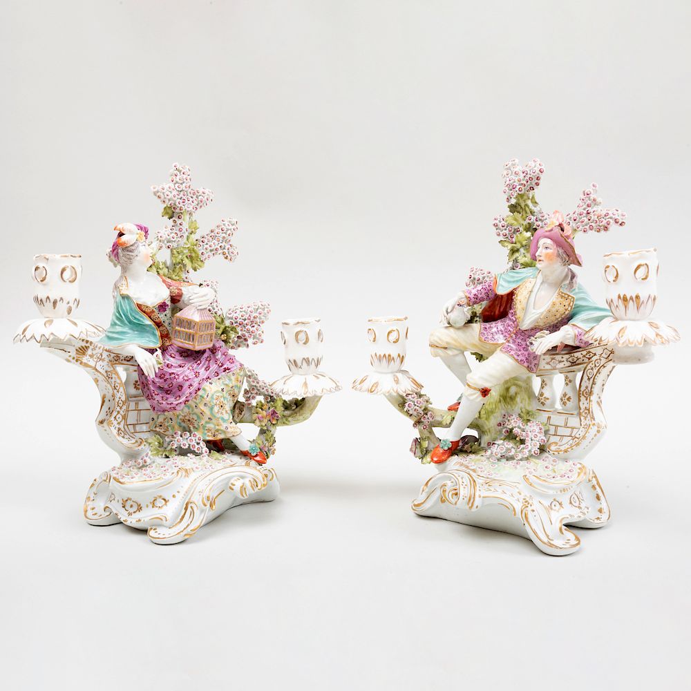 Appraisal: Pair of English Porcelain Bocage Two-Light Figural Candlesticks Emblematic of