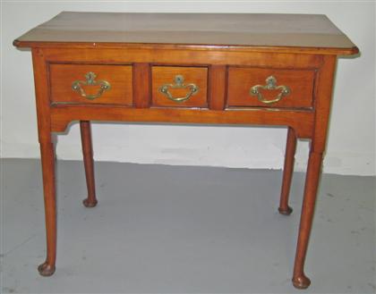 Appraisal: Queen Anne cherrywood dressing table pennsylvania th century Rectangular molded