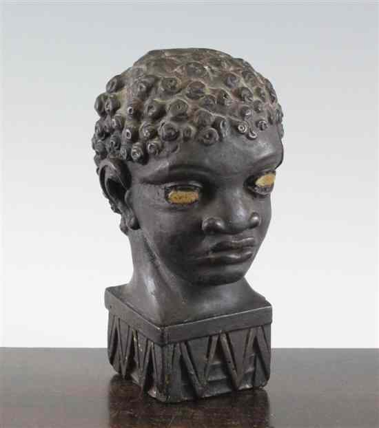 Appraisal: A George III carved and stained wood blackamoor head on