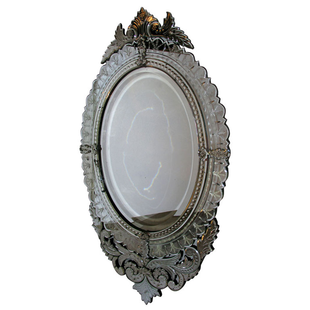 Appraisal: Venetian Style Mirror Framed Mirror With an oval mirror plate