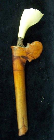 Appraisal: A Keris with wooden sheath and ivory handle