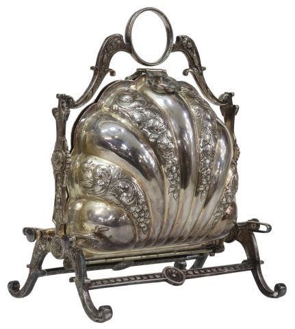 Appraisal: English silverplate muffineer bun warmer shell-form repousse and chased scroll