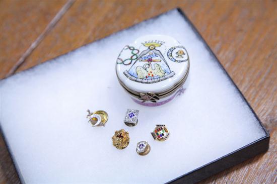 Appraisal: FIVE MASONIC PINS AND A LIMOGES BOX American and French