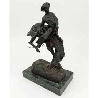 Appraisal: After Frederic Remington American - Bucking Bronco Bronze Sculpture on