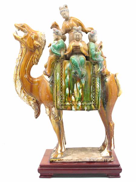 Appraisal: A Tang style glazed earthenware figure height in width in