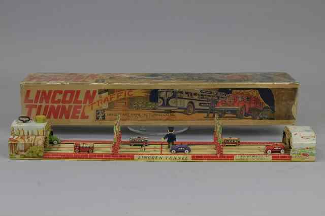 Appraisal: LINCOLN TUNNEL TOY Unique Art lithographed tin depicts car and